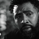 Cress Williams' Jefferson Pierce looks concerned in a black and white photo from Black Lightning's series finale "Closure."